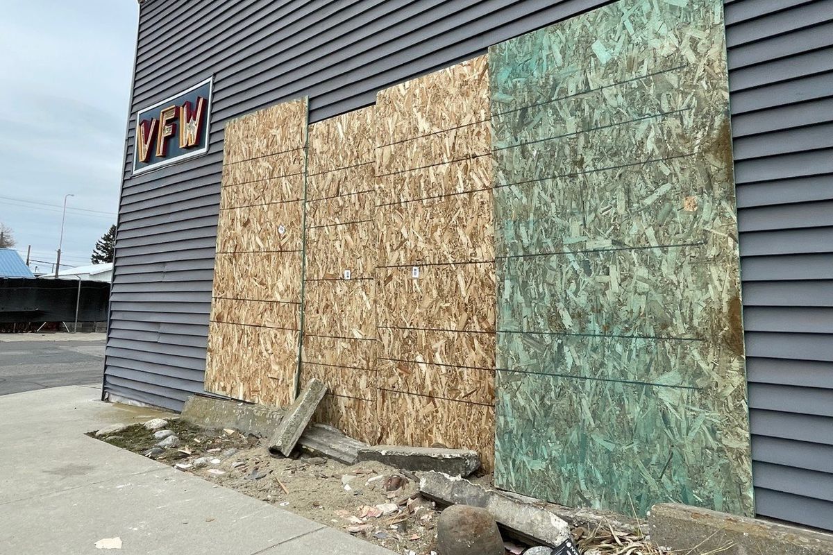 A truck drove through the side of the Hillyard Veterans of Foreign Wars Post 1474 before fleeing the scene Sunday morning in northeast Spokane. (Garrett Cabeza / The Spokesman-Review)