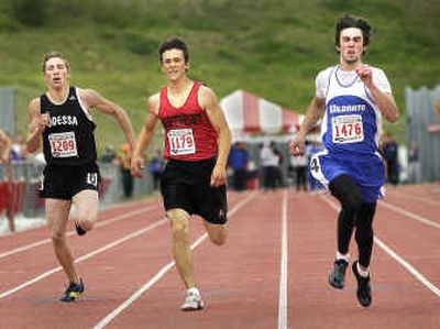 
Sprinters Braidy Haden, right, of Wilbur-Creston and Chad Butorac of Northport will face off again at the District 7 B meet. Butorac is the State B leader 100, 200 and 400. 
 (Brian Plonka / The Spokesman-Review)
