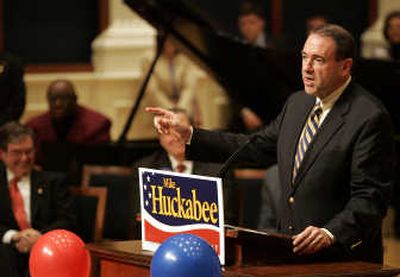 
Republican presidential hopeful former Arkansas Gov. Mike Huckabee speaks to supporters at Samford University in Birmingham, Ala., on Saturday. A book Huckabee wrote following school shootings in 1998 angered parents and victims. Associated Press
 (Associated Press / The Spokesman-Review)