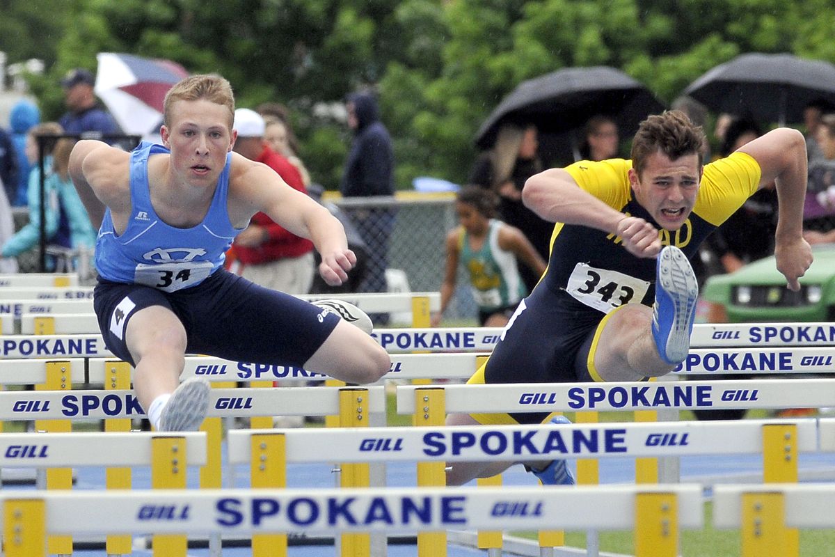 CV’s Parker Bowden, left, won the 110 hurdles in 14.99 seconds with Mead’s Sam Johnson second in 15.19. (Jesse Tinsley)