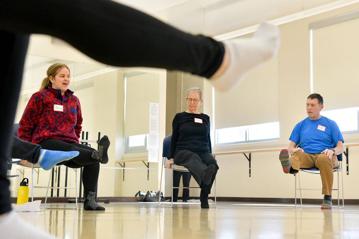 Assistant teacher Alexa Robinson leads Marsha Feller and George Richardson during a Dance for Parkinson’s group class on Saturday, Feb. 22, 2020, at Gonzaga University. National expert on Dance for Parkinson’s David Leventhal will visit Spokane during a March 11-14 conference at Gonzaga training regional dance instructors. (Tyler Tjomsland / The Spokesman-Review)