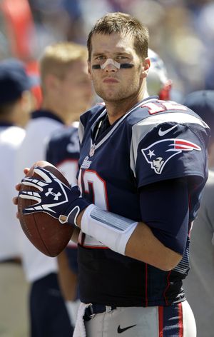 New England Patriots quarterback Tom Brady has been told by the NFL he has to sit out the first four games of the 2015 season. (Associated Press)