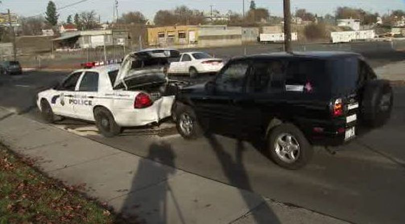 This photo shows an SUV that rear-ended a Spokane police cruiser Wednesday, Nov. 4, 2009. The patrol car was stopped on Maple Street just south of Sinto Avenue about 1 p.m. while Officer Jeff Graves helped a person. (KHQ-TV)