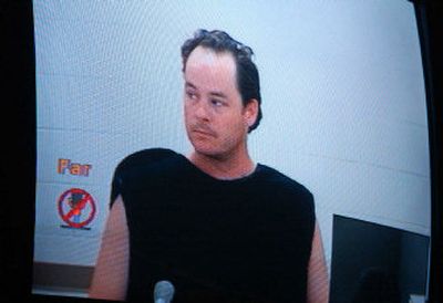 
Paul E. Hawkins made his first appearance via closed-circuit television  at the Kootenai County Jail on Monday. 
 (Kathy Plonka / The Spokesman-Review)