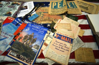 
Newspapers, sheets of music, v-mail are just a few of the items that will be on display at the Valley Heritage Museum's World War II exhibition of Valley memorabilia set for Memorial Day weekend. These items are a part of Rick Lloyd's collection.
 (Liz Kishimoto photos / The Spokesman-Review)