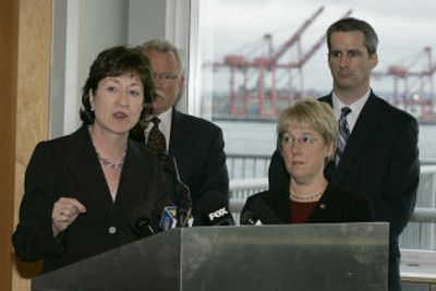 
Sen. Patty Murray, D-Wash, right, looks on as Sen. Susan Collins, R-Maine, chairwoman of the Senate Homeland Security Committee, talks to reporters Wednesday in Seattle. 
 (Associated Press / The Spokesman-Review)