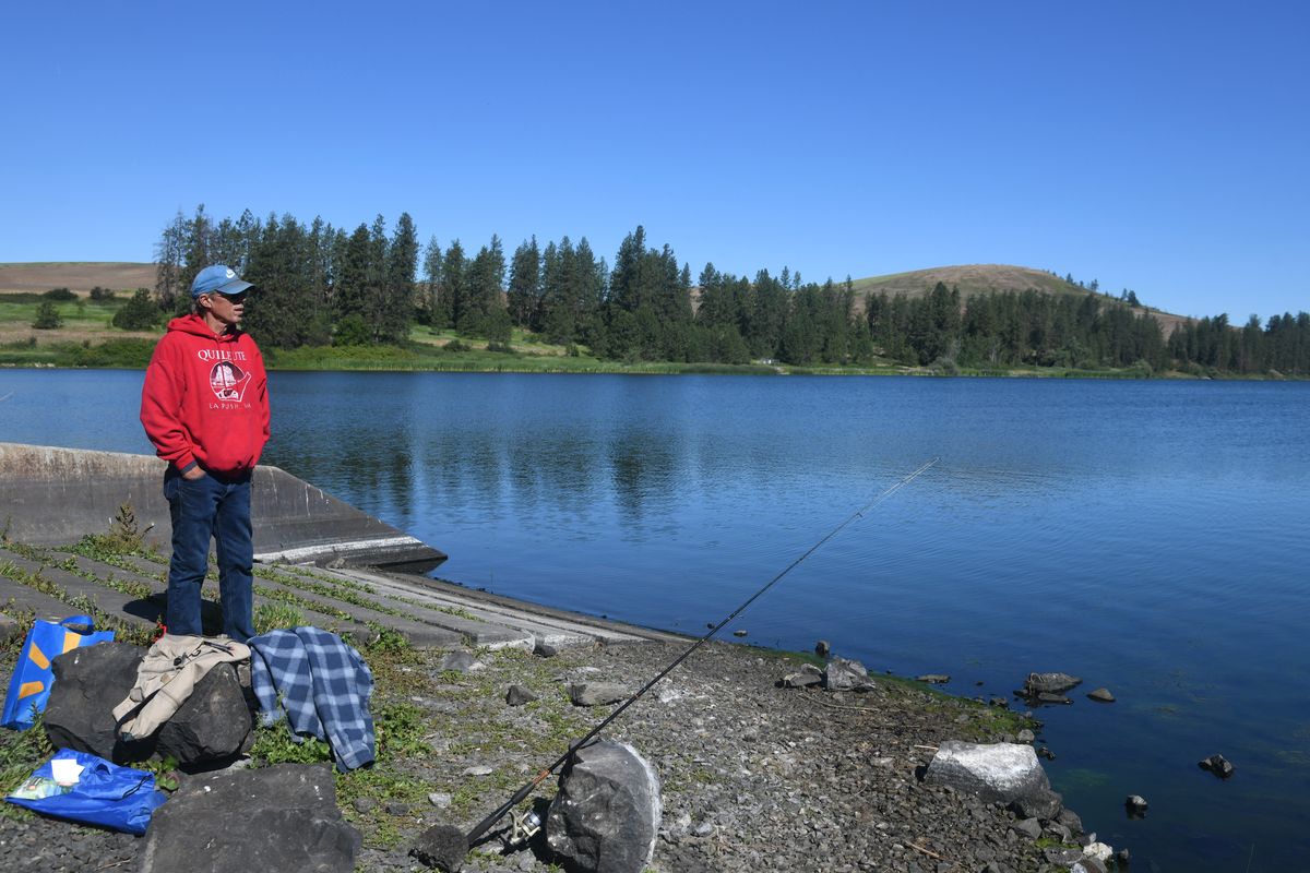 Bob Gyllstrom fishes at West Medical Lake on Friday.  (Michael Wright/The Spokesman-Review)