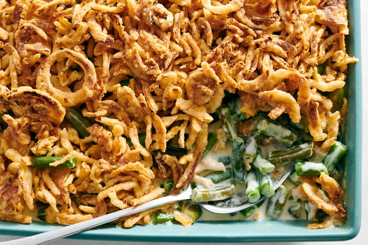In this green bean casserole recipe, half of the beans are simmered in broth to bring out their hypersavory flavors.  (DAVID MALOSH/New York Times)