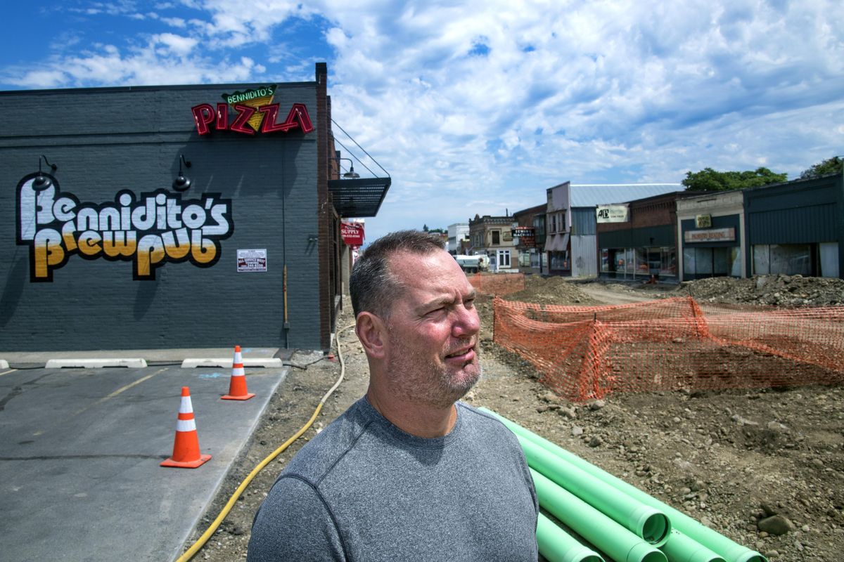 Chris Bennett, owner of Bennidito’s Brewpub, has a clear view of the construction on the east 1900 block of Sprague, Monday, June 26, 2017. (Dan Pelle / The Spokesman-Review)