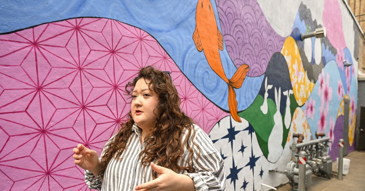 Artist Lisa Soranaka paints mural that honors Chinese, Japanese history of Trent Alley