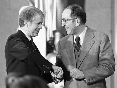 In  this 1977  photo, President JImmy Carter congratulates Griffin Bell after Bell took the oath of office as attorney general during a ceremony at the Justice Department.  (File Associated Press / The Spokesman-Review)