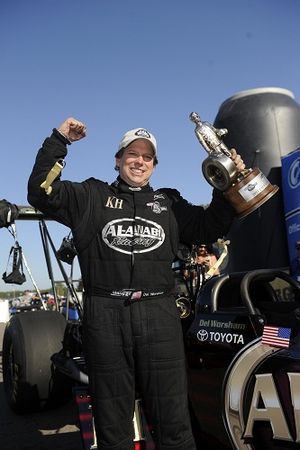 Del Worsham celebrates his victory at Gainesville. (Photo courtesy of NHRA)