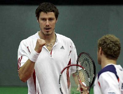 
 Marat Safin celebrates a win to advance to the Davis Cup Finals.
 (Associated Press / The Spokesman-Review)