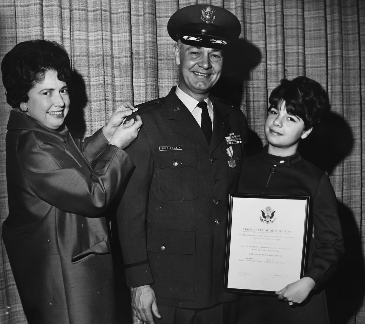 Martha Lou Wheatley, right, is seen with her mother and father, William Wheatley, at her father’s military retirement in the late 1960s. (Photo courtesy of Martha Lou Wheatley / Courtesy of Martha Lou Wheatley)