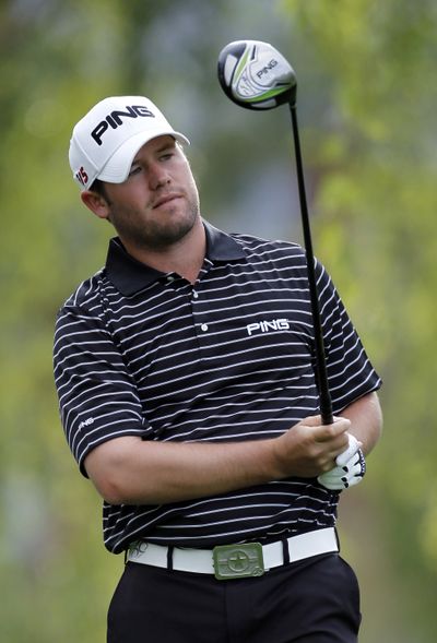 Alex Prugh watches his drive on the second hole on the Palmer course.  (Associated Press / Associated Press)