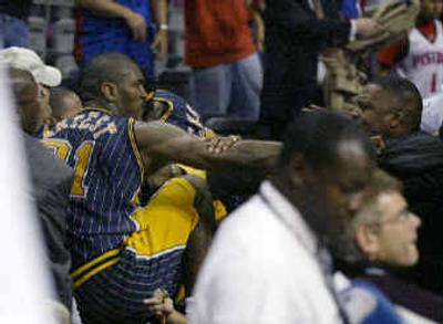 
Indiana's Ron Artest goes into the stands to fight with fans in Auburn Hills, Mich. 
 (Associated Press / The Spokesman-Review)
