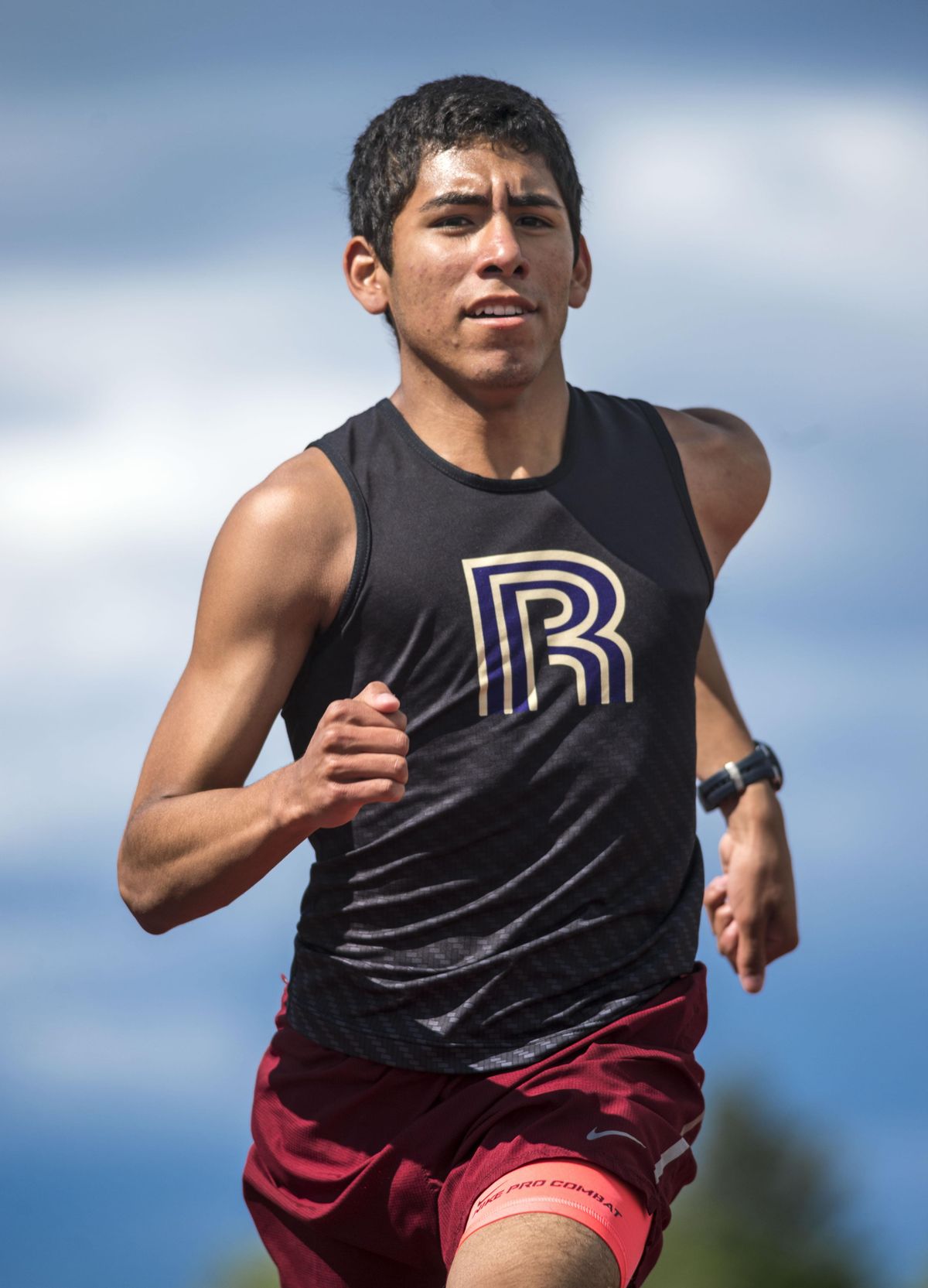 Rogers High School honor student and distance runner Roberto Lopez also works 30 hours a week at McDonald