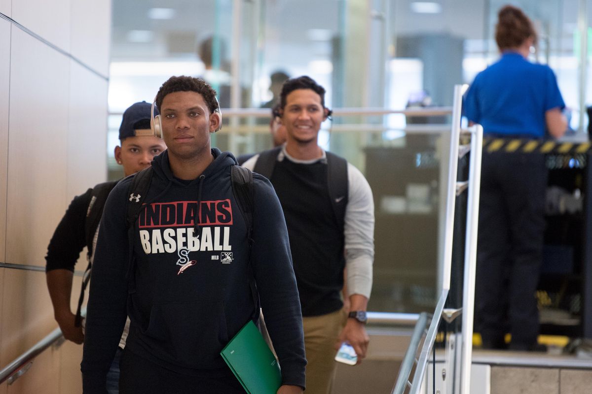 The Spokane Indians arrive on Friday, June 8, 2018, led by Curtis Terry at Spokane International Airport in Spokane, Wash. (Tyler Tjomsland / The Spokesman-Review)