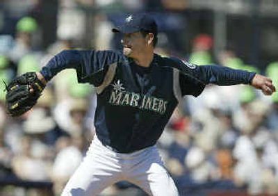 
The two sides of Jamie Moyer surfaced in Thursday's game against the Cubs in which he struck out the side in the first inning on 14 pitches then gave up a homer and a double off the wall in the second inning.
 (Associated Press / The Spokesman-Review)