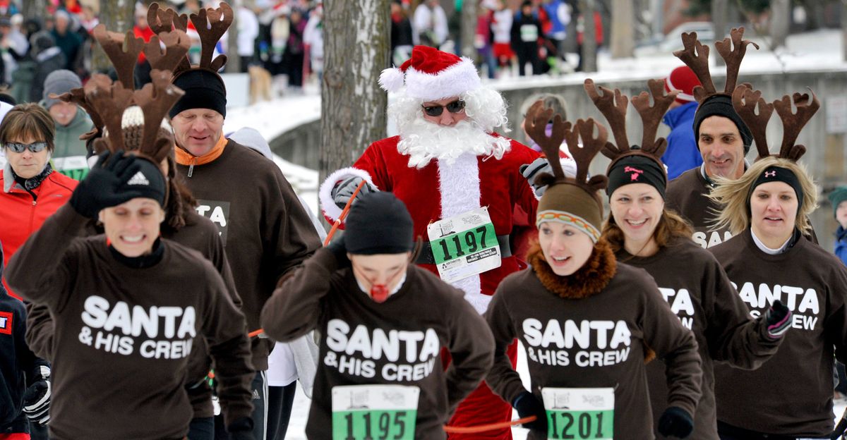 Santa and his crew hitch up and set off in the 2011 Jingle Bell 5K Run/Walk for Arthritis, in Spokane’s Riverfront Park. Eric McMillan, as Santa and the reindeer, from left, Amy Keene, Rob Nebergall, Jenny Keen, Melissa Rehn, Kristen Bailey, Greg Paul and Tausha Redmond were among a group of 11 members who collected $225 dollars for the Arthritis Foundation. Some 2,700 people, including 98 teams, participated and raised a total of $85,000.  (DAN PELLE/THE SPOKESMAN-REVIERW PHOTO ARCHIVE)