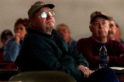
A biodiesel education PowerPoint presentation is reflected in the glasses of Rosalia farmer Dave Dowling during a meeting held at the Masonic Temple in Oakesdale, Wash., on Tuesday. 
 (Kathy Plonka / The Spokesman-Review)