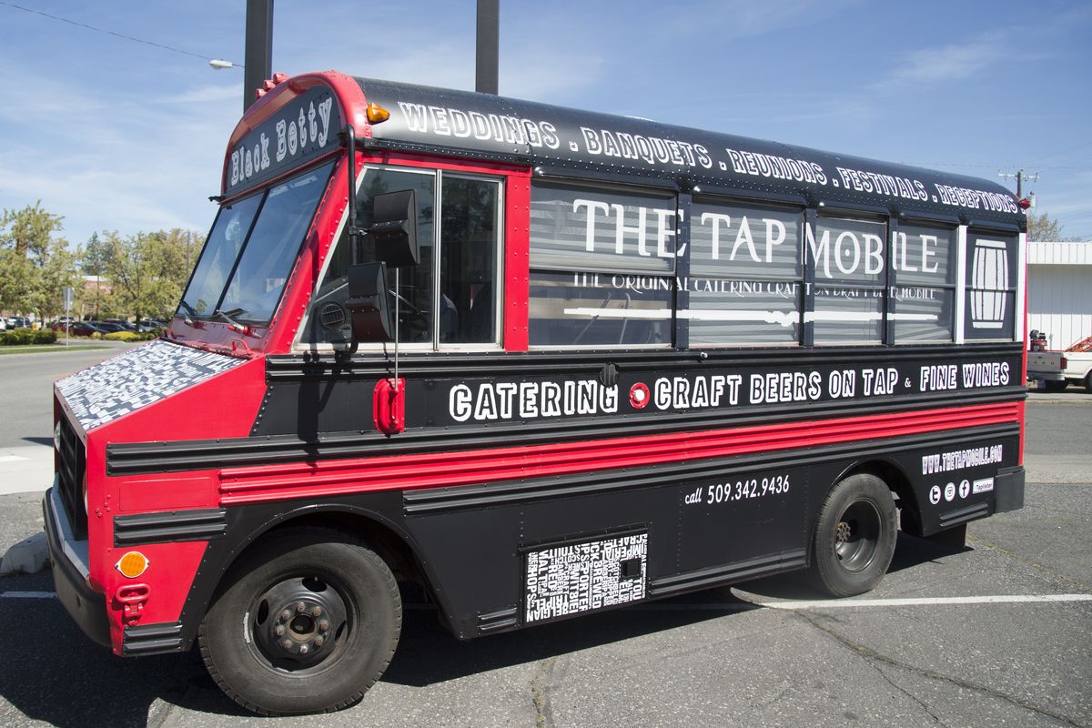 Mel Wood of the Hop Shop beer tasting room has recently completed the Tap Mobile, aka Black Betty, a mobile craft beer concession truck. (Jesse Tinsley)