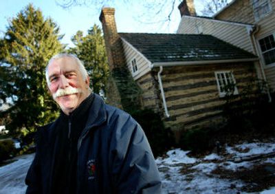 
Greg Mallet-Prevost stands in front of the cabin in Rockville, Md., where Josiah Henson, the man whom Harriet Beecher Stowe used as a model for the Uncle Tom character, lived. 
 (Associated Press / The Spokesman-Review)