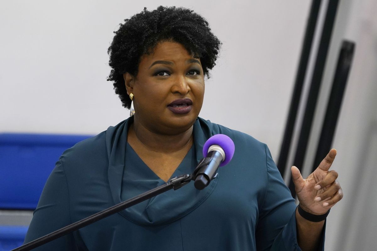 FILE - Stacey Abrams speaks during a church service in Norfolk, Va., Sunday, Oct. 17, 2021. A political organization led by the Democratic titan is branching out into paying off medical debts. Fair Fight Action on Wednesday, Oct. 27 told The Associated Press that it is donating $1.34 million from its political action committee to wipe out debt owed by 108,000 people in Georgia, Arizona, Louisiana, Mississippi and Alabama.  (Steve Helber)