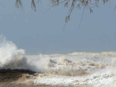 
Sixth of six photos in a sequence showing the beach at Khao Lak, Thailand, on Dec. 26. The photos, which show the water first receding and then forming into the first wave that crashed ashore, were found on the memory card from the digital camera of a North Vancouver couple, when their bodies were identified recently. 
 (AP photo/Knill family / The Spokesman-Review)