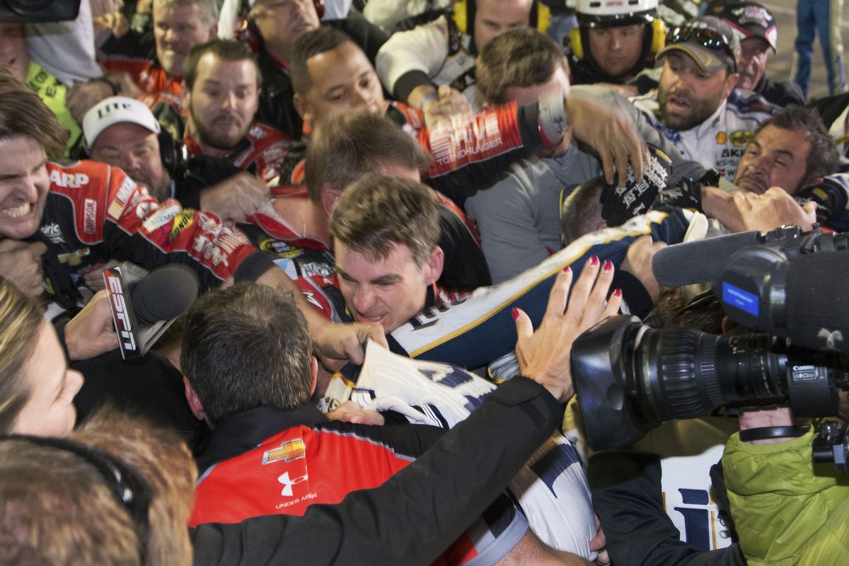 Jeff Gordon is in the middle of a brawl after the NASCAR Sprint Cup Series race in Fort Worth, Texas. (Associated Press)