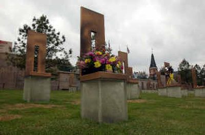 
Flowers rest on Baylee Almon's memorial chair in the Field of Empty Chairs at the Oklahoma City National Memorial on Monday. Today would have been her 11th birthday. 
 (Associated Press / The Spokesman-Review)