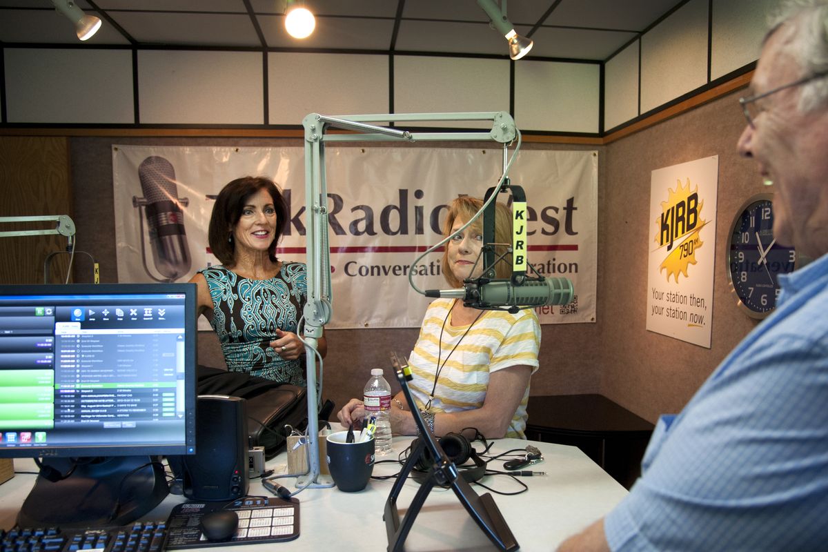 Julie Humphreys, left, Debra Wilde and Kent Adams rehearse for their boomer-focused talk radio programming on KJRB. (Dan Pelle)