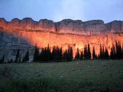 
Sunrise on the Chinese Wall, a 1,000-foot high, 22-mile long escarpment along the Continental Divide, captured with a digital camera by Spokane hiker Rick Diffley on Day 3 of a six-day, 70-mile backpacking trip through the Bob Marshall Wilderness of Montana.Sunrise on the Chinese Wall, a 1,000-foot high, 22-mile long escarpment along the Continental Divide, captured with a digital camera by Spokane hiker Rick Diffley on Day 3 of a six-day, 70-mile backpacking trip through the Bob Marshall Wilderness of Montana.
 (Photo courtesy of Rick Diffley / The Spokesman-Review)