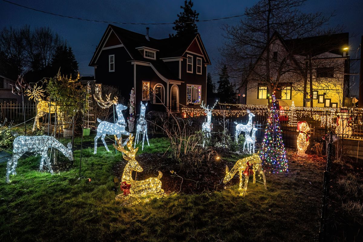 This holiday display at 648 S. Arthur St. features Santa’s reindeer grazing in the front yard.  (COLIN MULVANY/THE SPOKESMAN-REVIEW)