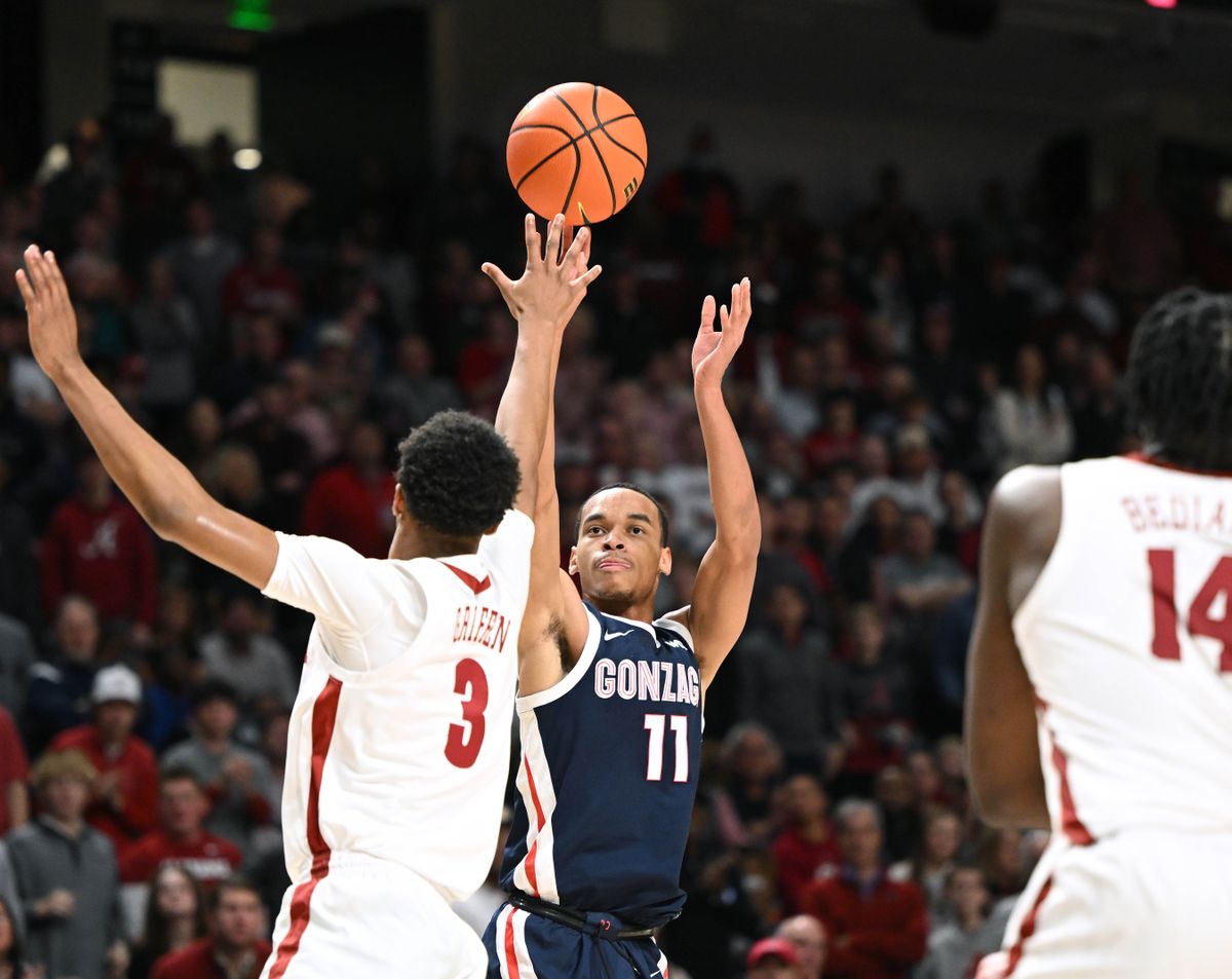 Gonzaga guard Nolan Hickman, who scored 13 points, shoots over Alabama’s Rylan Griffen during the second half.  (Jim Meehan / The Spokesman-Review)