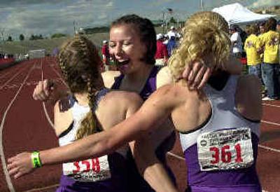 
Rogers' team celebrates after the dramatic victory in the relay. Rogers' team celebrates after the dramatic victory in the relay. 
 (Rajah Bose/Rajah Bose/ / The Spokesman-Review)