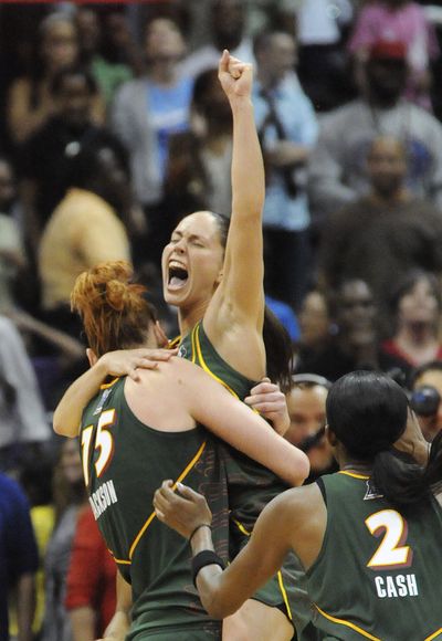 Seattle Storm guard Sue Bird, right, celebrates with Lauren Jackson, of Australia, after the Storm defeated the Atlanta Dream 87-84 in Game 3 of the WNBA basketball finals Thursday, Sept. 16, 2010, in Atlanta, sweeping the series. (Eric Lesser / Fr53108 Ap)