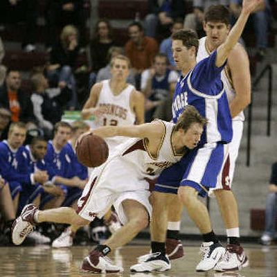 
Former Shadle Park and EWU player Danny Pariseau, with ball, leads Santa Clara in assists.
 (Associated Press / The Spokesman-Review)