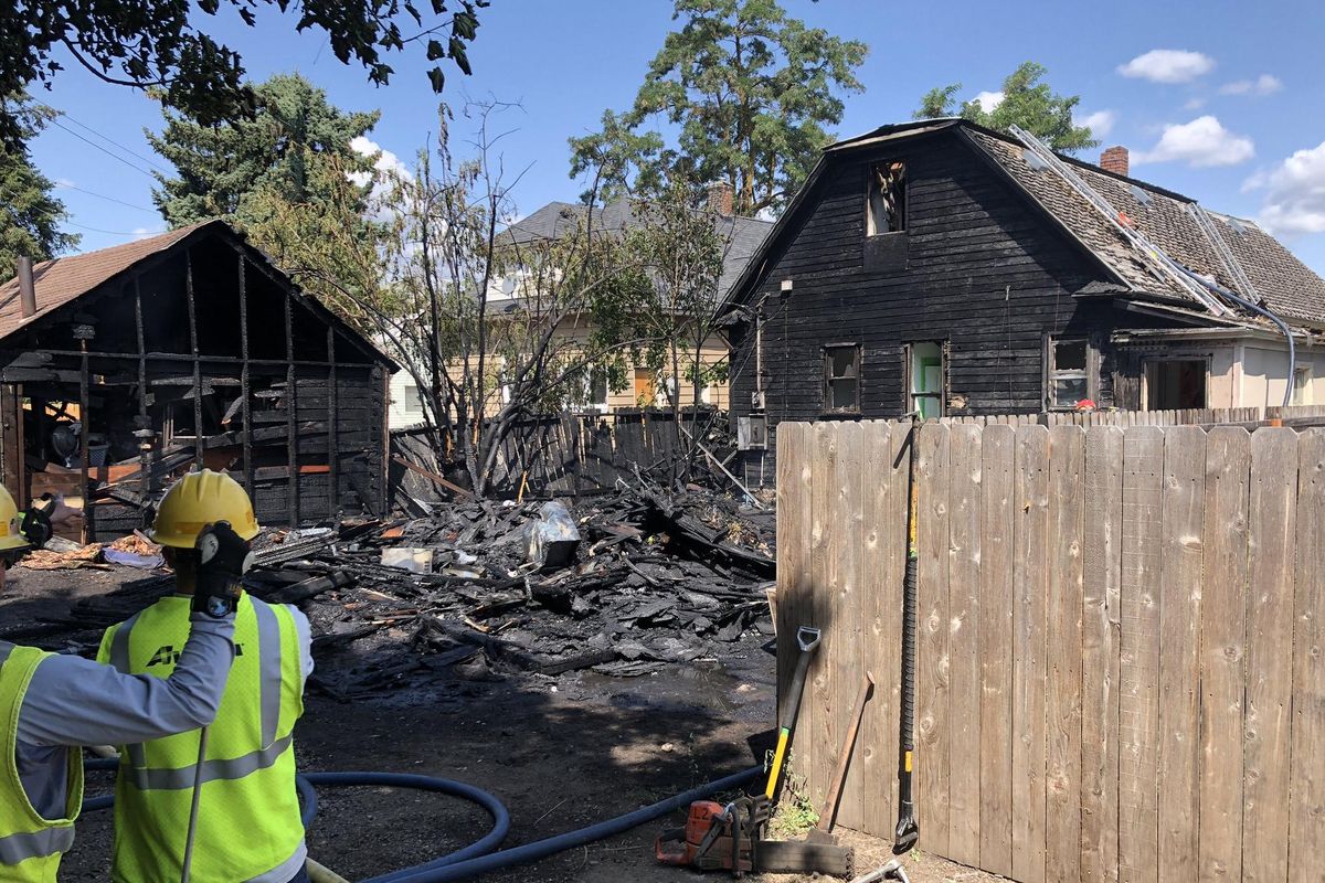 The Spokane Fire Department is investigating a fire that started Friday in a detached shed behind a house at 2323 W. Mallon Ave at about 10:30 a.m. No one was reported injured. (Will Campbell/The Spokesman-Review)