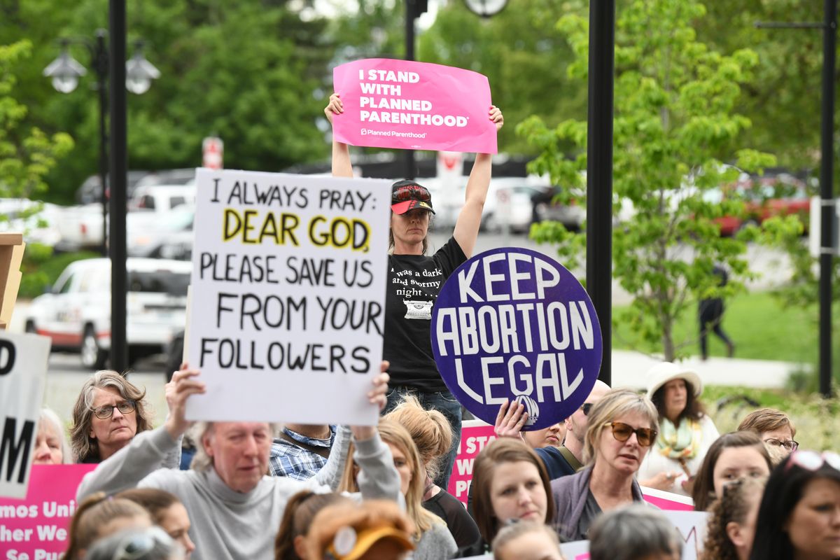 Pro-choice protesters gather to reaffirm their opposition to recent state laws in Georgia and Alabama Tuesday, May 21, 2019 at the Gathering Place plaza next to Spokane City Hall. (Jesse Tinsley / The Spokesman-Review)
