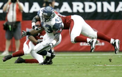 
It's up to Leonard Weaver to carry the ball at fullback for the Seahawks with the retirement of Mack Strong. Associated Press
 (Associated Press / The Spokesman-Review)