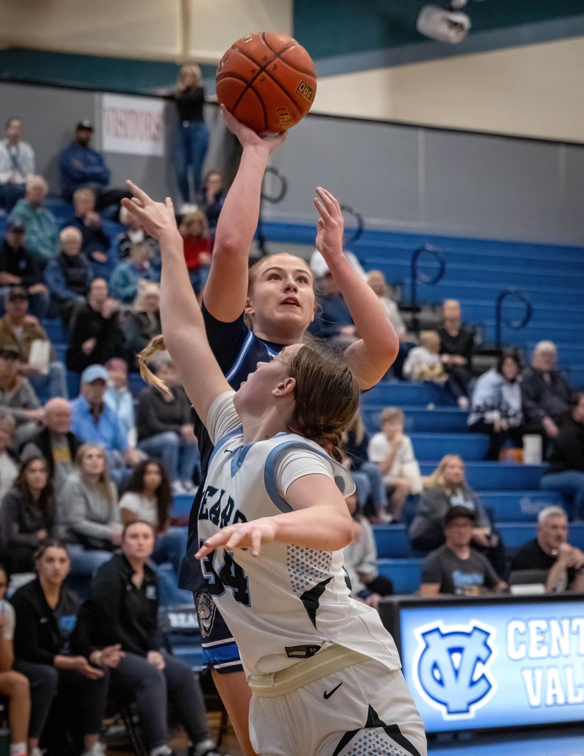 Gonzaga Prep guard Aylah Cornwall (32) shoots the ball over Central Valley guard Olivia Patshkowski (34) during the first half of a GSL girls high school basketball game, Thursday, Dec. 11, 2025, at Central Valley High School. (Colin Mulvany/The Spokesman-Revi)