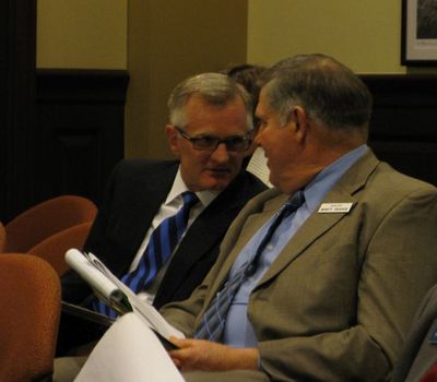 Defense attorney Chuck Peterson, left, confers with Sen. Monty Pearce, R-New Plymouth, right, during a Senate ethics committee meeting Monday morning on an ethics complaint against Pearce. (Betsy Russell)