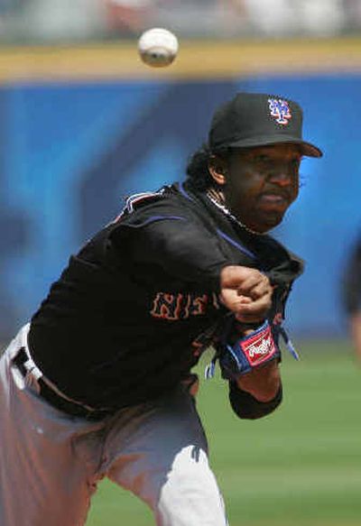 
Mets pitcher Pedro Martinez threw a two-hitter in a 6-1 win over the Braves.
 (Associated Press / The Spokesman-Review)