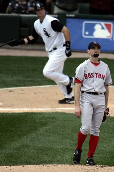 
Boston Red Sox starter Matt Clement watches the flight of A.J. Pierzynski's three-run homer Tuesday during the first inning of the Chicago White Sox's 14-2 opening-game win in the American League Division Series at Chicago. 
 (Associated Press / The Spokesman-Review)