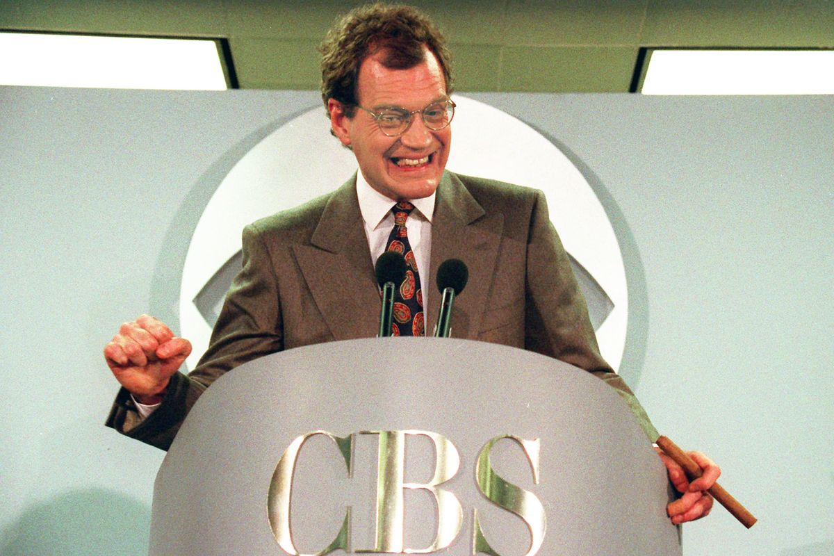 This Jan. 15, 1993, file photo shows talk-show host David Letterman announcing his new contract with CBS television for his new show “The Late Show with David Letterman.” Letterman will step down next week. (Associated Press)