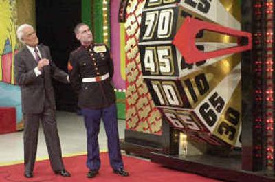 
Bob Barker, left, host of the game show 