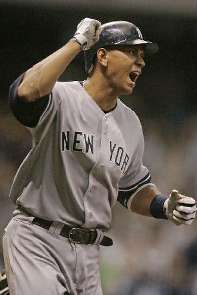 
New York's Alex Rodriguez reacts after hitting his 400th career home run on Wednesday. 
 (Associated Press / The Spokesman-Review)