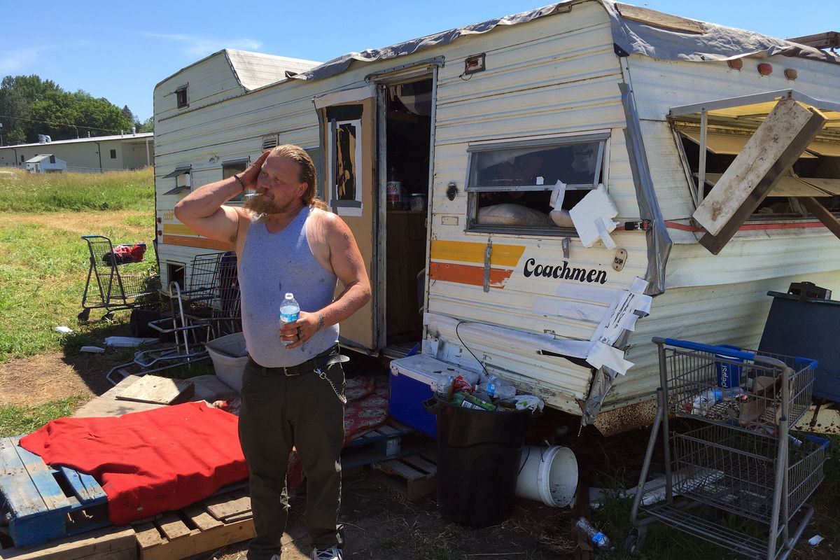 Erik Sloan lives on a city-owned lot in north Colville. In the coming months, the city wants to move him and his neighbors to a city-sponsored homeless encampment about a mile away.  (James Hanlon/The Spokesman-Review)