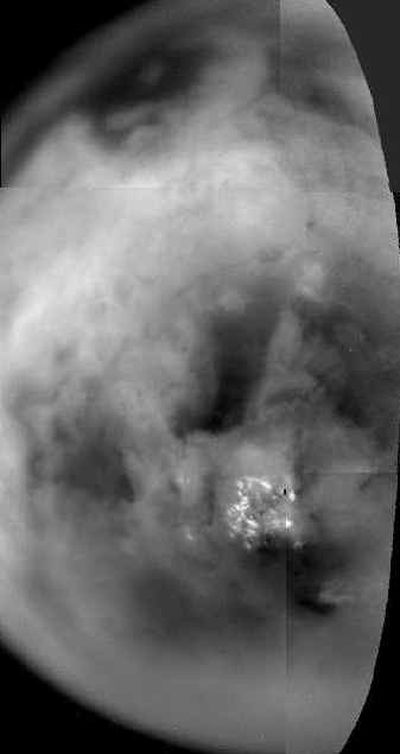 Part of Saturn's moon Titan is shown as Cassini passed within 210,600 miles Friday.
(Associated Press / The Spokesman-Review)